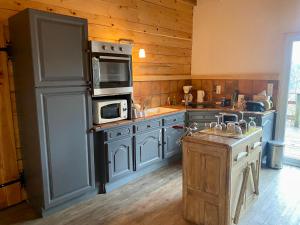 Kuchyň nebo kuchyňský kout v ubytování Chalet vue lac