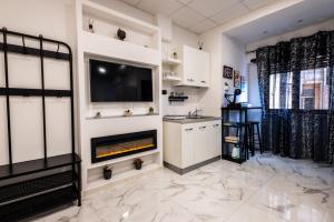 Kuchyň nebo kuchyňský kout v ubytování SUITE SPACE by concept italy