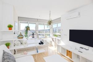 Telewizja i/lub zestaw kina domowego w obiekcie Sun Apartments
