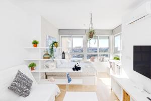 Telewizja i/lub zestaw kina domowego w obiekcie Sun Apartments