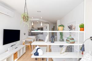 Telewizja i/lub zestaw kina domowego w obiekcie Sun Apartments