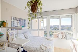Łóżko lub łóżka w pokoju w obiekcie Sun Apartments