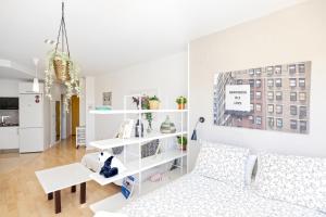 Łóżko lub łóżka w pokoju w obiekcie Sun Apartments