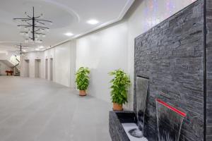 Telewizja i/lub zestaw kina domowego w obiekcie Sun Apartments