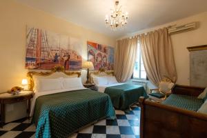 Postel nebo postele na pokoji v ubytování Morali Palace