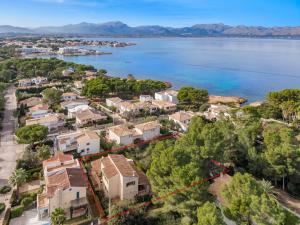 an aerial view of a town with the water at Villa Manresa in Alcudia by JS Villas in Alcudia