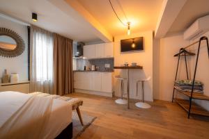 Ein Bett oder Betten in einem Zimmer der Unterkunft Madrid Suites