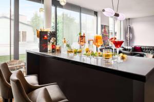 Napoje w obiekcie Amedia Luxury Suites Graz, Trademark Collection by Wyndham