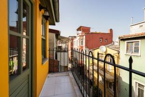 a balcony with a view of a city at Classy Duplex Apartment w Balcony Near Golden Horn in Istanbul