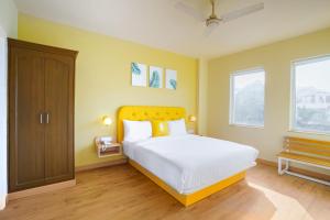 Postel nebo postele na pokoji v ubytování Bloom Hotel - GK2