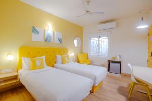 Postel nebo postele na pokoji v ubytování Bloom Hotel - GK2