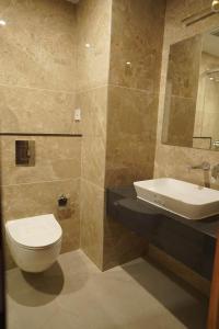 Koupelna v ubytování HOTEL VKJ INN Aluva