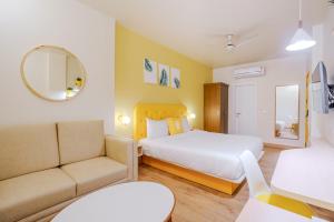 Postel nebo postele na pokoji v ubytování Bloom Hotel - GK2
