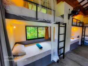 Postel nebo postele na pokoji v ubytování Jungle Escape Hiriketiya