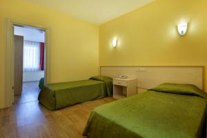 Postel nebo postele na pokoji v ubytování Garden Park Beldibi Hotel