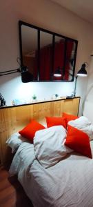 Ένα ή περισσότερα κρεβάτια σε δωμάτιο στο Résidence le chalet des orres
