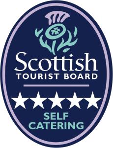 a sign for a scottish tourist board with stars at Camden House luxury home near Ben Nevis Scotland Highlands in Fort William