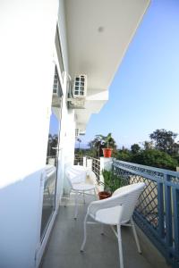 Parveke tai terassi majoituspaikassa Hotel Mahadev Rishikesh