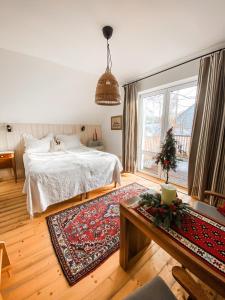 a bedroom with a bed and a christmas tree in it at Istebna 401 MURY in Istebna