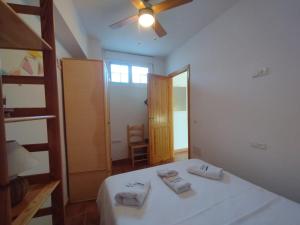 Кровать или кровати в номере Casa Noray
