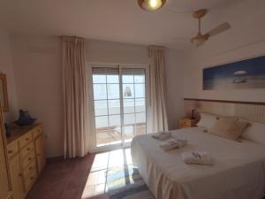 Кровать или кровати в номере Casa Noray