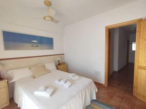 Кровать или кровати в номере Casa Noray