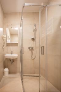 Koupelna v ubytování Hotel Magdalena