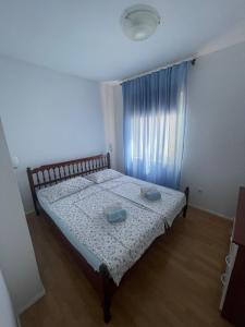 Postel nebo postele na pokoji v ubytování Apartments G&G