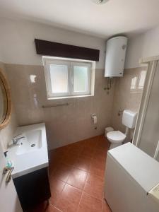 Koupelna v ubytování Apartments G&G + 25 fotografií