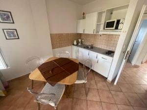 Kuchyň nebo kuchyňský kout v ubytování Apartments G&G