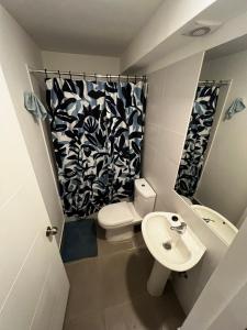 Ванная комната в Departamento hasta 6 personas en Quintero