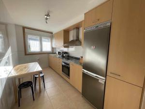 Kuchyň nebo kuchyňský kout v ubytování Grupo Gontad Apto Heol - Cabana de Bergantiños