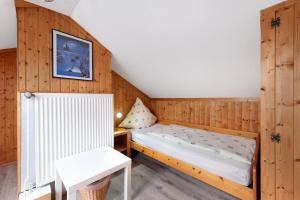 Postel nebo postele na pokoji v ubytování Landferien Schütt