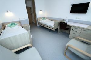 Posteľ alebo postele v izbe v ubytovaní Sanatorium Równica