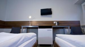 Posteľ alebo postele v izbe v ubytovaní Sanatorium Równica