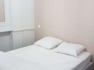 Posteľ alebo postele v izbe v ubytovaní Appartement 12 pers. neuf, centre-ville avec 5 chambres et local à ski - FR-1-234-289