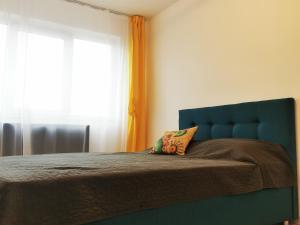 Nikos Residence tesisinde bir odada yatak veya yataklar