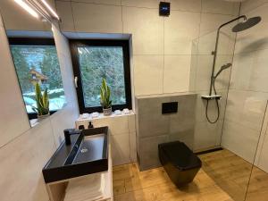 Kúpeľňa v ubytovaní Apartmán A29-2, Hrabovo, Ružomberok