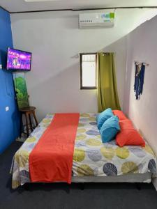 Bato's Place tesisinde bir odada yatak veya yataklar