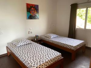 Postel nebo postele na pokoji v ubytování Cap Mora mora