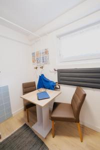 Posezení v ubytování Ferienhaus Schöne Aussicht Ferienwohnung Blau