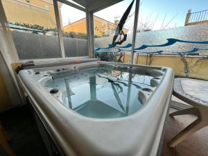 Gambar di galeri bagi Village naturiste - Villa Le spa de la Palmeraie - 3 chambres - 100 m2 di Cap d'Agde