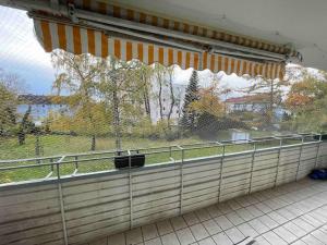 a large window with a view of a field at Gemütliche 3 Zimmer Wohnung Ruben in Wolfenbüttel