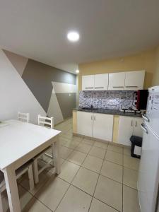 Apartamentos El Fortín的厨房或小厨房