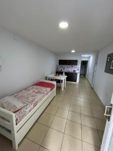 Apartamentos El Fortín客房内的一张或多张床位