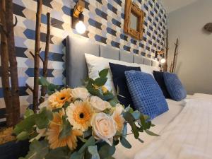Posteľ alebo postele v izbe v ubytovaní Resort Lesní Lázně