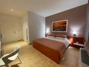 Postel nebo postele na pokoji v ubytování Motel Vespucci
