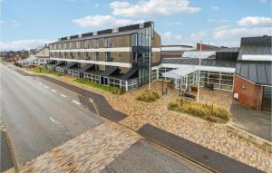 an aerial view of a building with a skateboard at Fan Bad, Lejl, 50 in Fanø