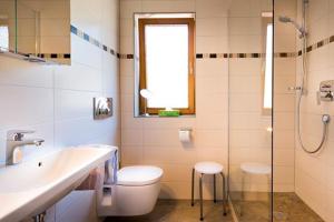 Koupelna v ubytování Haus Kaufmann + 11 fotografií