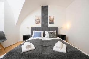 Postel nebo postele na pokoji v ubytování City Center Mödling